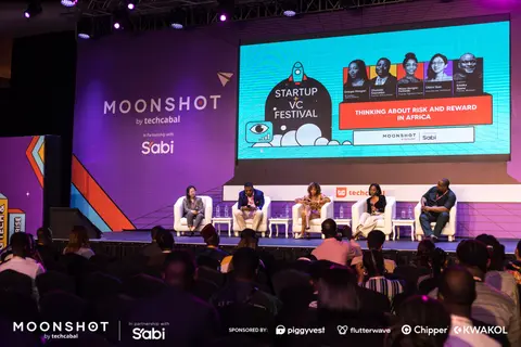 Panelists seated on the Startup VC Festival stage.