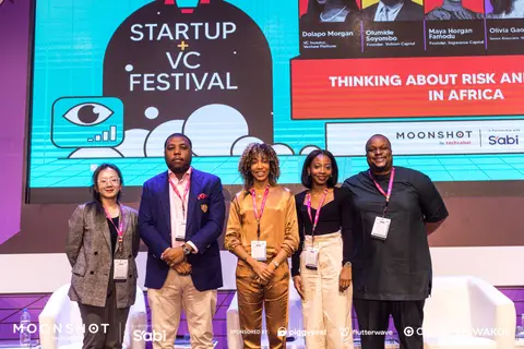 Panelists pose together on the Startup VC Festival stage.
